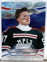 Front of Kirill Kaprizov 2022-23 Upper Deck MVP Domains card #NA-20 with holographic foil background