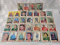 All 32 hockey cards laid out in rows