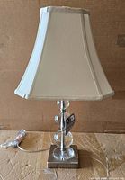 Full view of lamp with shade, cord visible