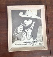 Front view of framed signed photo