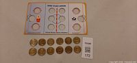 Full view of display board and twelve bronze medallions