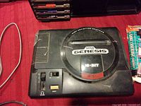 Top view Sega Genesis console showing logo and wear
