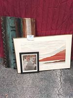 all four artworks grouped: two tall canvas panels, large framed print, small framed print