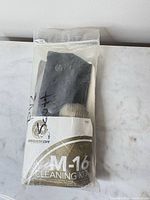 Front view of sealed BrigadeQM M-16 cleaning kit package