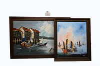 Front view of both framed paintings