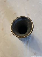 Top view showing interior glaze and gold-rim detail