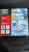 front of box showing brand and items included