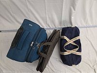 All three bags side by side showing relative sizes and colours