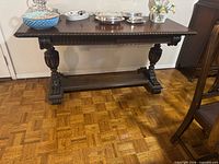 Full view of Empire style carved wood library table