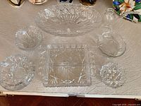 Top view of all seven crystal pieces arranged on table