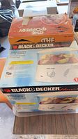Black & Decker and West Bend appliance boxes side by side