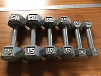 All six dumbbells aligned showing weight numbers