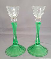 Both candlestick holders front view