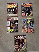 Group shot showing all five magazines laid out