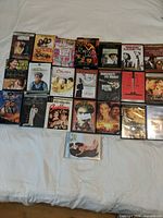 Overall shot of all DVD cases laid out, showing quantity and variety