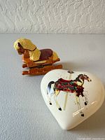 Heart-shaped box with carousel horse and rocking horse box together