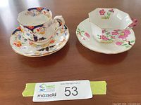 Overview of both teacup and saucer sets