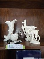 Group shot of all porcelain pieces on shelf