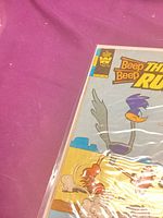 Front top-left of comic showing title banner and Whitman logo