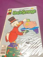 Front cover of Uncle Scrooge comic in plastic sleeve