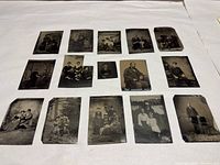 All fifteen tintype photographs laid out