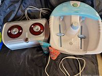 Conair foot spa, HoMedics massager, two cream tubes with cords