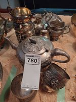 Group shot showing teapot, goblets, cups, creamer and sugar bowl