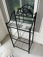 Full view of black metal rack front