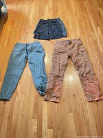 All three garments laid out on floor