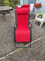 Front view of red zero-gravity chair
