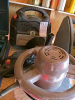 Photo of Black & Decker buffer/polisher with case and cord visible