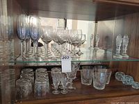 Cabinet view showing all stemware, tumblers, cordials, candlesticks