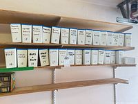 Full view of two shelves with 22 numbered hardware bins