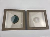 Both framed agate shadow boxes front view