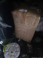 Sealed cardboard shipping box containing the bedding set