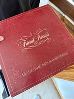 Top view of burgundy Trivial Pursuit Baby Boomer Edition box