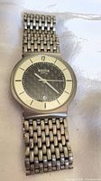Front view showing dial, bracelet and overall design