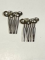 Front view of both rhinestone combs