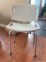 Front view of adjustable shower chair