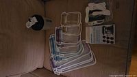 All items laid out: reusable bags, shaker bottle, cord wraps, appliance sliders package