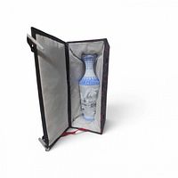 Vase inside open padded presentation box showing form, decoration and packaging
