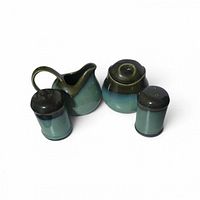 Top view of full four-piece set showing glaze and matching design