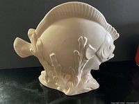 Left side view of matte white fish planter