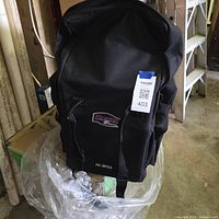 Front view of Kuryakyn Full Dresser bag showing logo and overall size