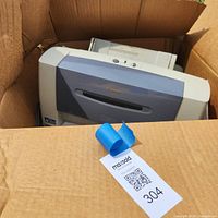 Canon S330 printer in box with accessories visible