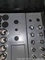 Close-up of molded tray showing socket drive labels and adapters