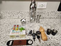 Group view of all barware items on countertop
