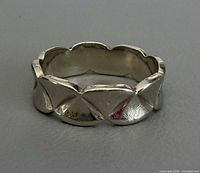 Ring exterior showing scalloped petal design