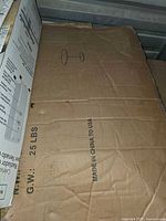 Unopened shipping box marked 25 lbs made in China