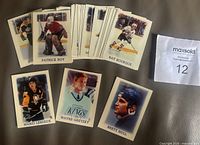 Fronts of several star cards and partial stack of remaining cards
